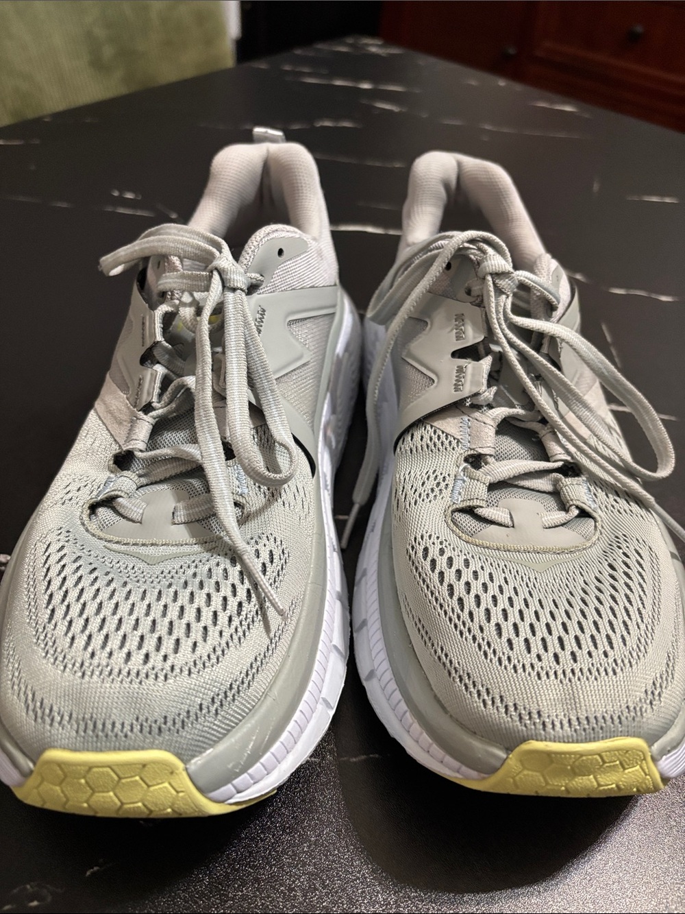 Hoka Light Gray and Yellow Running Shoes